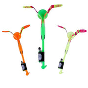 Spin Copter is a colorful butterfly-shaped flying toy with a central green ball on a white background.