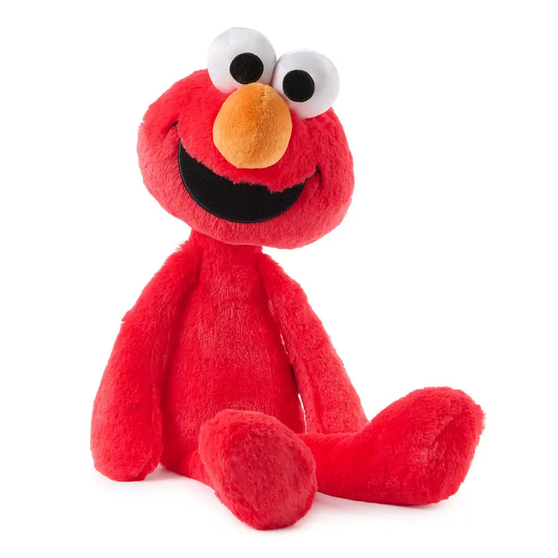 GUND Toothpick Elmo red plush seated on white with long floppy legs and orange nose.