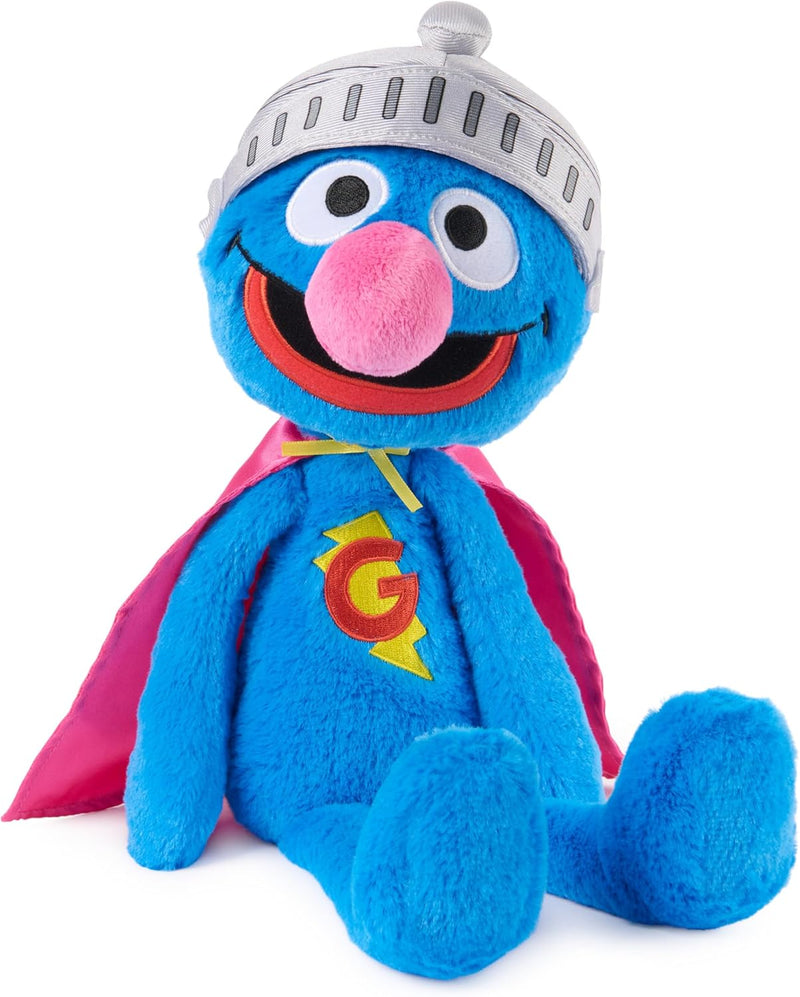 GUND Toothpick Super Grover blue plush wearing a silver helmet and pink cape, seated on white.