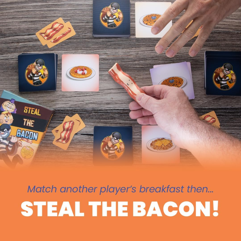 Board game with cards and bacon-themed tokens on a wooden surface.