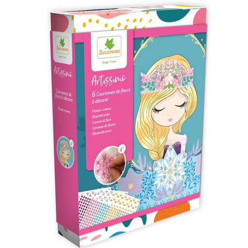 Sycamore Design Flora 'Artissimo' flower crown kit in its retail packaging, featuring a pink and teal box with an illustration of a blonde fairy and decorative flower designs.
