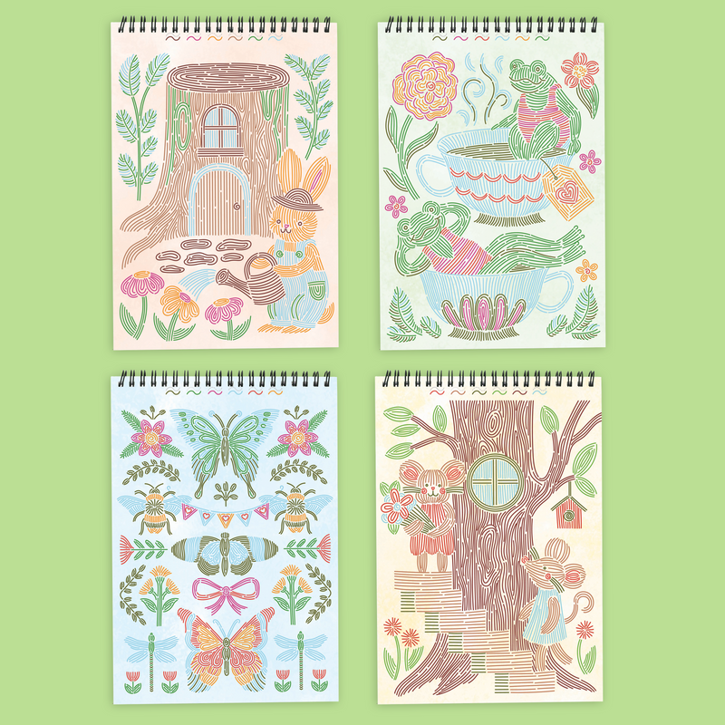 Four spiral-bound coloring books with woodland themed line art designs including trees, teacups, butterflies, and flowers
