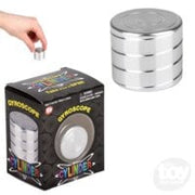 Silver metal gyroscope cylinder toy with hand demonstration and black retail packaging box