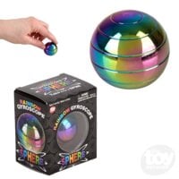 Rainbow metallic gyroscope sphere being held by hand with black packaging box