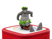 Gray Baloo bear Tonie figure with green leaf skirt on red Toniebox audio player