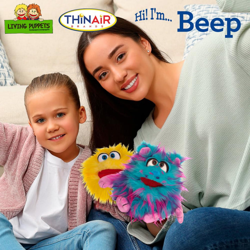 Woman and child holding colorful plush puppet with 'ThinAir' and 'Living Puppets' branding.