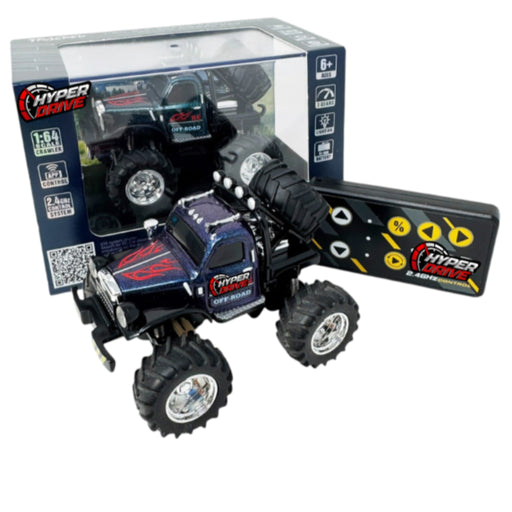 A remote-controlled mini monster truck toy shown with its packaging box and matching black remote control on a plain white background. The truck is dark blue with red and white graphics, large black off-road tires, and the box and remote both display the Hyper Drive branding.