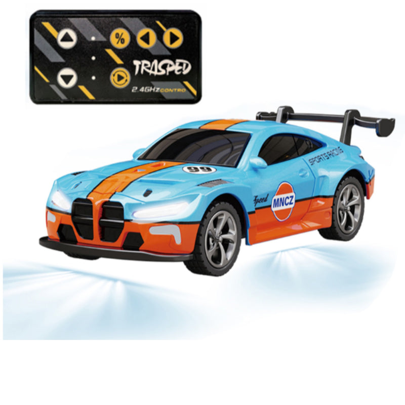 A blue and orange mini remote control toy race car with a black rear wing, shown alongside its black and yellow handheld remote control on a white background with light effects underneath.