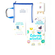 Artistic coloring activities set with paper pad, crayons, and easel on a white background
