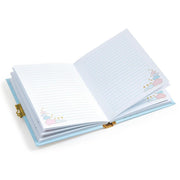 Open Djeco Tinyly Prunelle secret notebook showing lined pages with cloud decorations