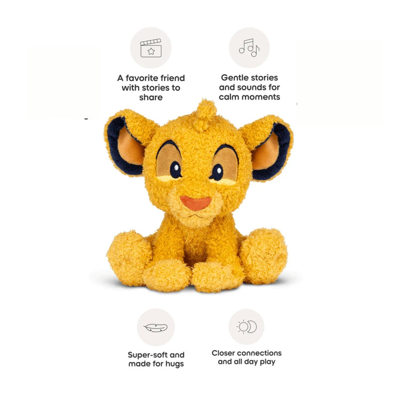 A plush lion cub toy centered on a white background, with four circular feature callouts and short text above and below it. The toy appears to be a soft yellow/golden lion cub with dark navy inner ears, large dark eyes, and a small orange-red nose and mouth area.