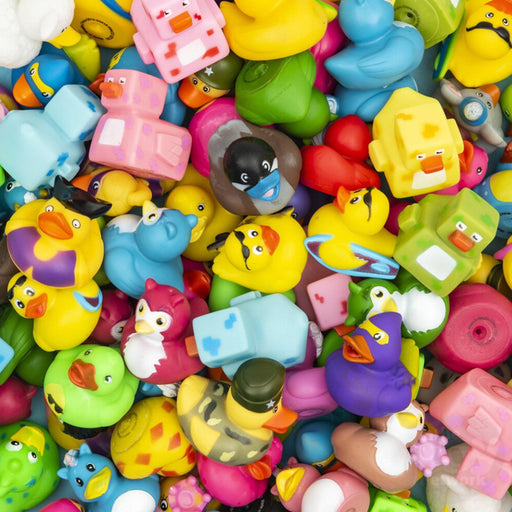 A dense pile of colorful small ducks in yellow, blue, pink, green, and purple, mixed with other cartoon animal and house-shaped bath toys.