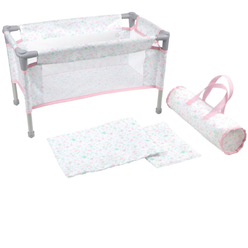 Baby travel playpen with mattress and blanket on a white background.