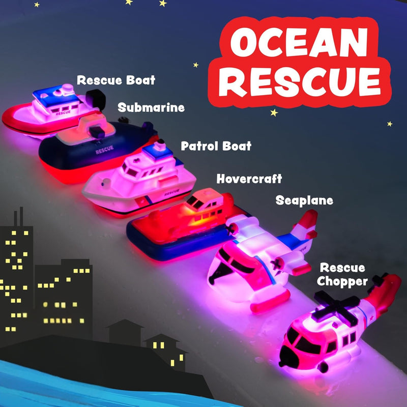The Ocean Rescue team of vehicles on a dark background.  Shows lighted vehicles that include: a rescue boat, submarine, patrol boat, hovercraft, seaplane, and resue chopper.