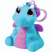 Blue squishy dragon toy with purple accents, large glittery black eyes and white horn
