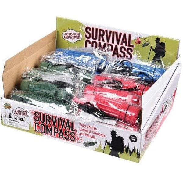 Display box of survival compasses in multiple colors including red, green, and blue