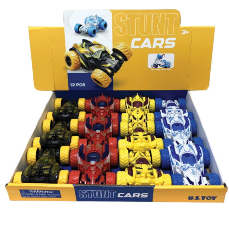 A retail display box of 12 plastic stunt cars in multiple colors, including black, red, yellow, and blue, with a yellow header card labeled 'STUNT CARS'.