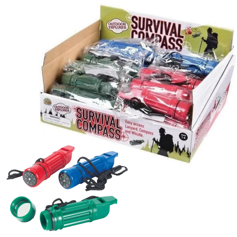 A display box of outdoor survival compasses with several loose compasses shown in front on a white background. The box is labeled 'Survival Compass' and 'Outdoor Explorer,' and the compasses come in red, blue, green, and dark gray/black.