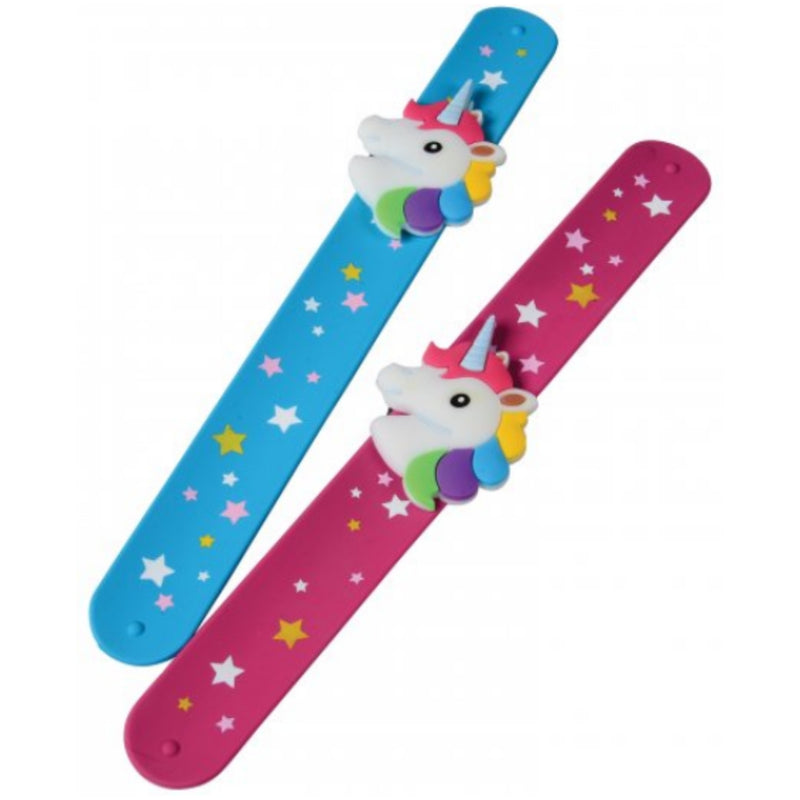 Two silicone wristbands, one blue and one pink, both decorated with white stars and featuring a 3D white unicorn charm with a colorful horn and mane.