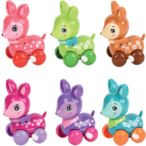 Six colorful plastic toy deer arranged in two rows on a plain white background. The toys come in pink, green, orange, purple, and blue, each with white polka dots and a small bow on their chests.
