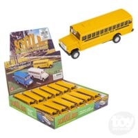 Yellow diecast school bus toy with display box showing multiple buses