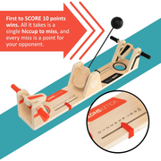 Wooden slingshot game with text on a colorful background.