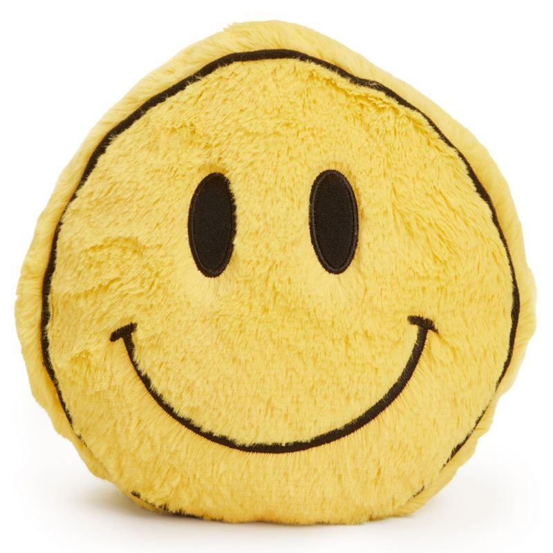 A round yellow plush smiley face pillow with black embroidered eyes and a curved smile, shown on a plain white background.