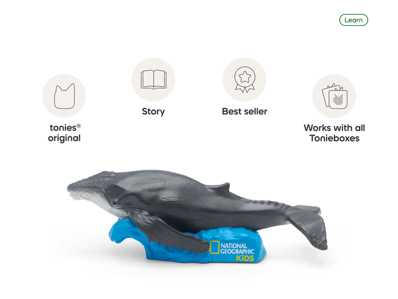 Tonies whale figurine on blue wave base with National Geographic Kids branding