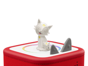 White cat-like Tonie figure with stars on red Toniebox speaker with colorful display