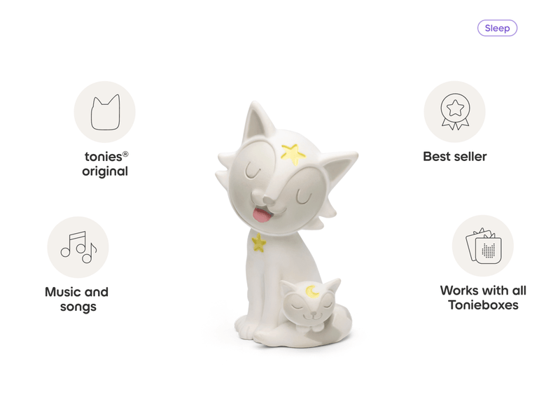 White Tonie figure of sleeping cat with star on professional background with feature callouts