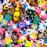 Assorted colorful 3D printed collectibles that  include -- ducks, bunnies, dinosaurs, eggs, robots, gnomes and more.