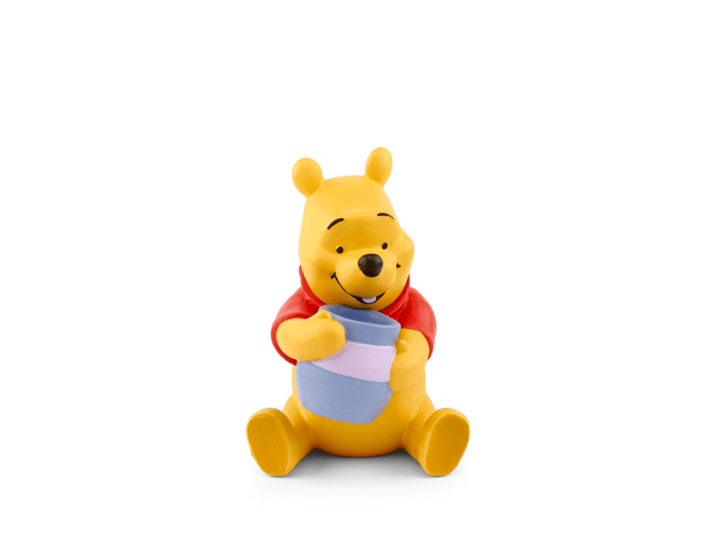 Winnie the Pooh Tonie figure sitting and holding honey pot on white background