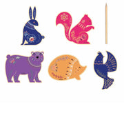 Set of colorful animal-shaped pins on a white background