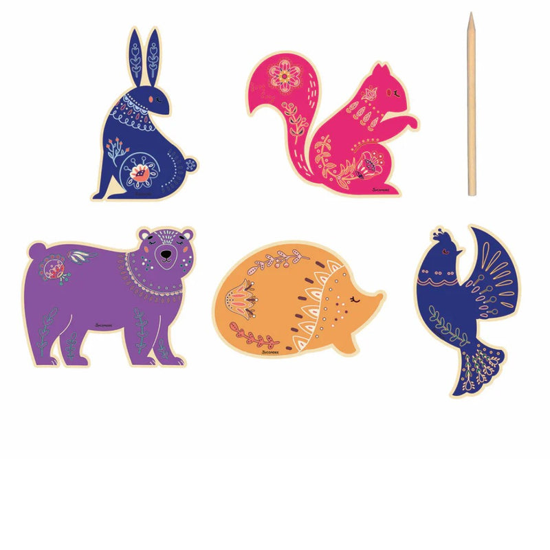 Set of colorful animal-shaped pins on a white background