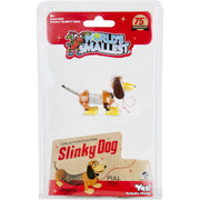 Slinky Dog collector's edition pull toy in its original blister packaging, featuring a 75th anniversary badge and a cartoon dachshund illustration.