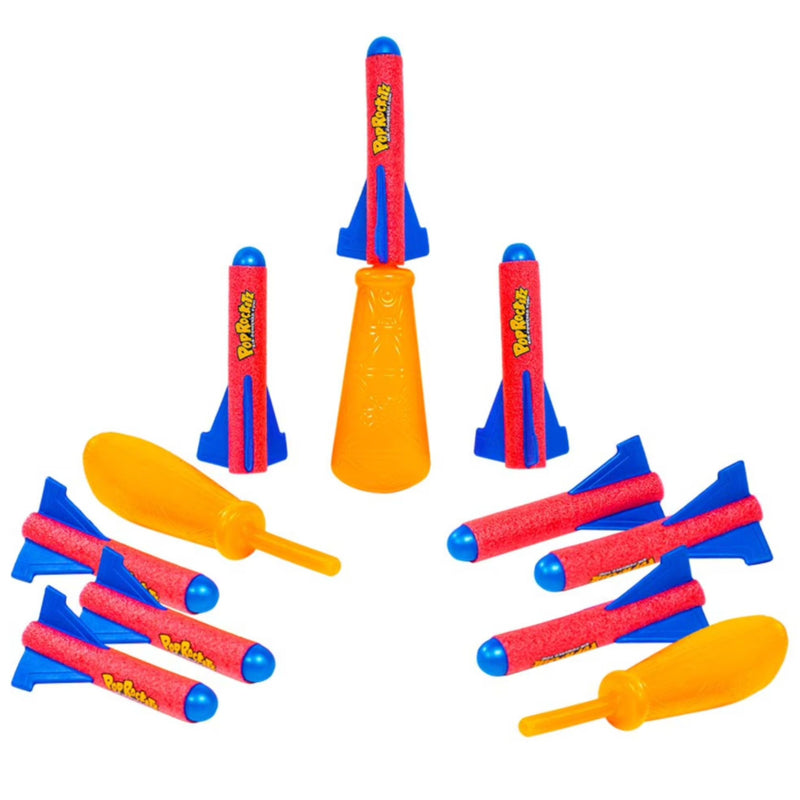 A set of plastic toy foam rockets and nose cones in red, blue, and orange, arranged on a plain white background. The red rockets feature yellow 'Pop Rocket' branding.