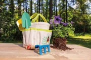 Kids garden hand tools set with tote bag, trowel, and fork displayed outdoors
