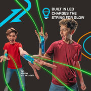 Two teens playing with ZipString Aracna devices creating glowing green light strings