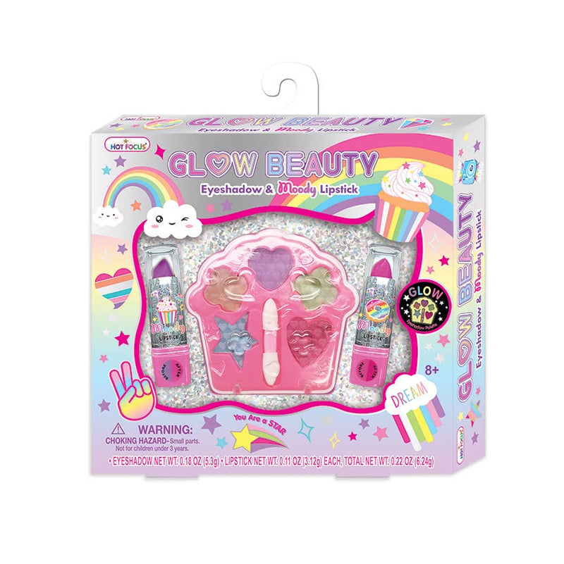 Hot Focus Glow Beauty makeup set with rainbow-themed packaging showing eyeshadow palette and lipsticks