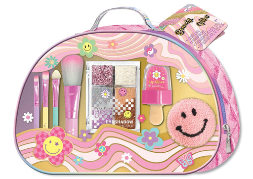 Pink makeup kit in groovy flower patterned case with cosmetics and smiley face patch