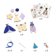 DJECO DIY Butterflies craft kit with wooden shapes, decorative papers, and assembly materials