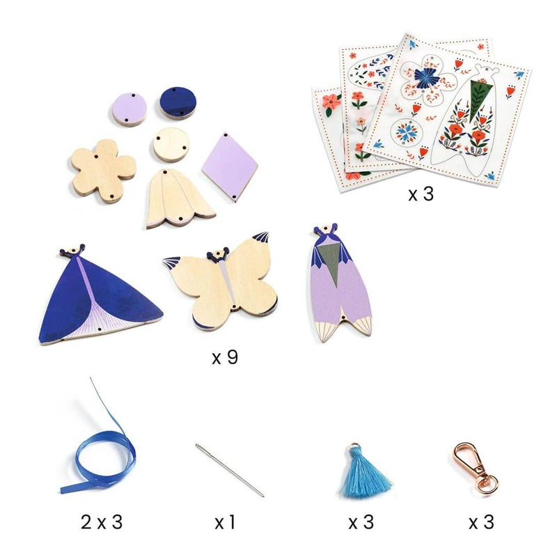 DJECO DIY Butterflies craft kit with wooden shapes, decorative papers, and assembly materials