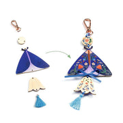 DIY butterfly craft kit showing assembly components and finished decorative butterflies with floral patterns