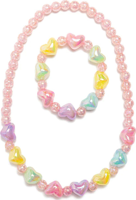Pink beaded necklace and bracelet set with colorful heart-shaped accent beads
