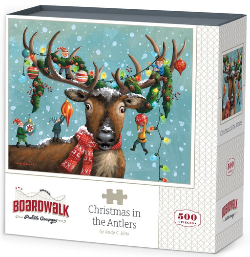 Boardwalk Puzzles Christmas In The Antlers 500-piece jigsaw puzzle box featuring whimsical reindeer artwork