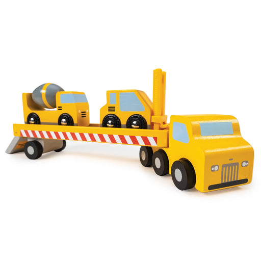 Yellow wooden construction transporter truck carrying cement mixer and forklift toys