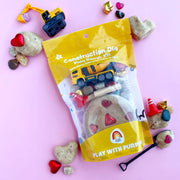 Valentine's themed construction play dough kit with excavator toys and heart-shaped dough pieces