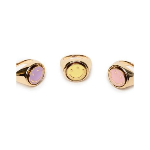Three gold spinner rings with colorful smiley face designs on white background