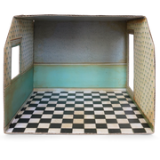 Cardboard dollhouse room interior with checkered floor and floral wallpaper