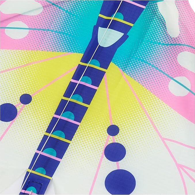 Close-up detail of colorful butterfly kite showing wing pattern with geometric designs